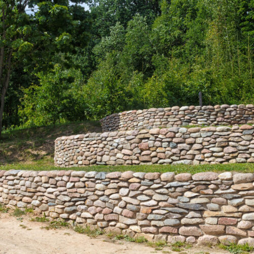 retaining wall of cobblestones in the city park