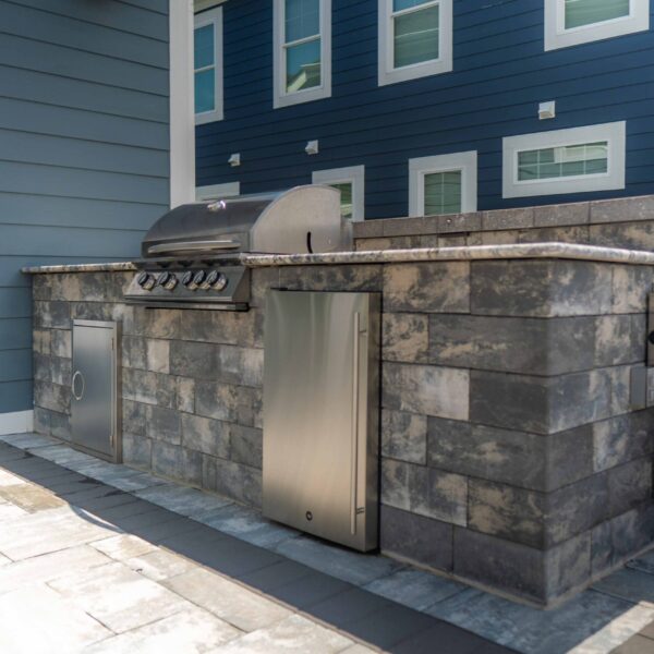 Elevate your outdoor living with custom outdoor kitchens from HCE Site Maintenance, serving Rehoboth, Bethany Beach, Fenwick Island, Lewes, Dewey Beach, the Delaware Beaches, Maryland, and Delmarva. Our expert team designs and installs high-quality outdoor kitchens tailored to your style and needs. Enjoy cooking and entertaining in a beautifully crafted space that combines functionality and aesthetics. Trust HCE to create the perfect outdoor kitchen for your home. HCE Delivers excellence in outdoor kitchen solutions.