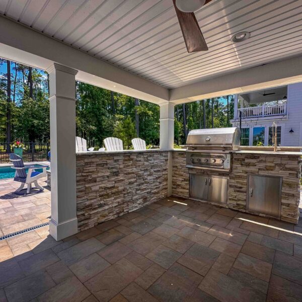 Elevate your outdoor living with custom outdoor kitchens from HCE Site Maintenance, serving Rehoboth, Bethany Beach, Fenwick Island, Lewes, Dewey Beach, the Delaware Beaches, Maryland, and Delmarva. Our expert team designs and installs high-quality outdoor kitchens tailored to your style and needs. Enjoy cooking and entertaining in a beautifully crafted space that combines functionality and aesthetics. Trust HCE to create the perfect outdoor kitchen for your home. HCE Delivers excellence in outdoor kitchen solutions.