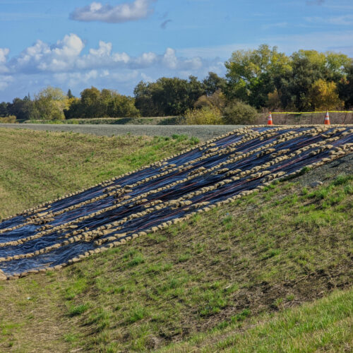 The Levee repair Sacramento after the storm under the cloudy skies